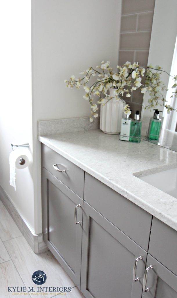 Benjamin Moore Classic Gray is great for home staging. With Escarpment painted vanity and Bianco Drift bathroom countertop by Kylie M Interiors