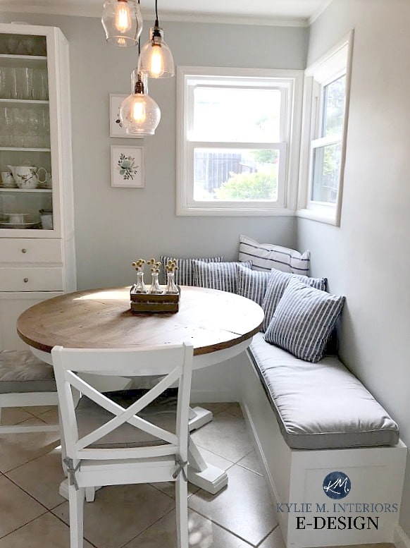 Benjamin Moore Gray Cashmere in kitchen eating nook with built in bench, cushions and round farmhouse style table. Kylie M Interiors Edesign, online paint colour blog and consulting