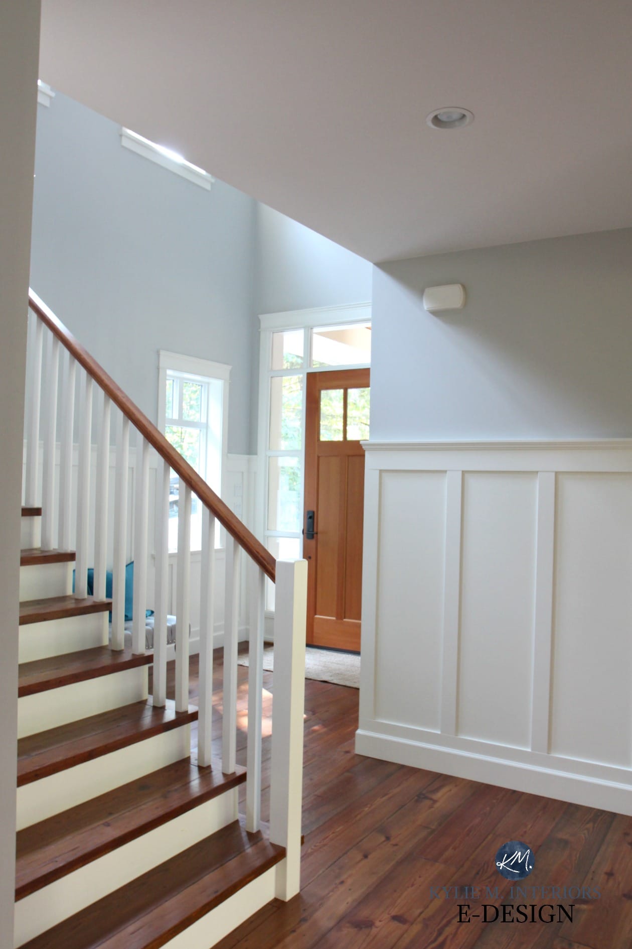 Entryway, stairwell, reclaimed pine wood flooring, treads, white railing, white wainscoting. Benjamin Moore Cloud White and Gray Owl. Kylie M Interiors Edesign, online paint colour and decorating blog