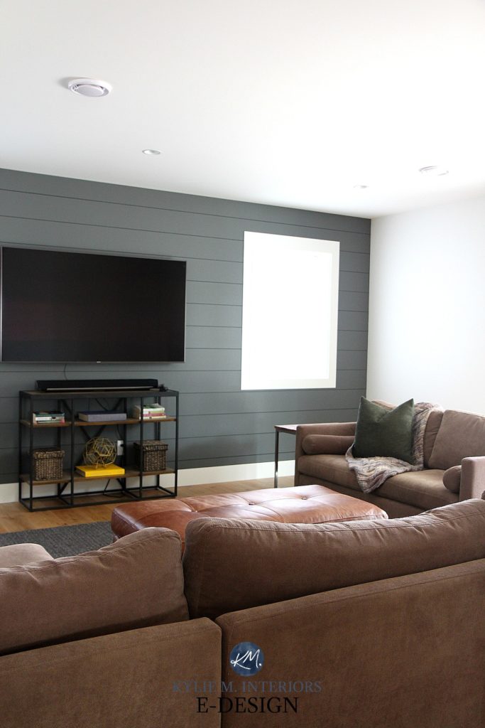 Family room, tv hung on wall, shiplap feature wall Sherwin Williams Grizzle Gray with beige sectional, south facing exposure. Kylie M Interiors Edesign, online paint colour consulting, advice blog