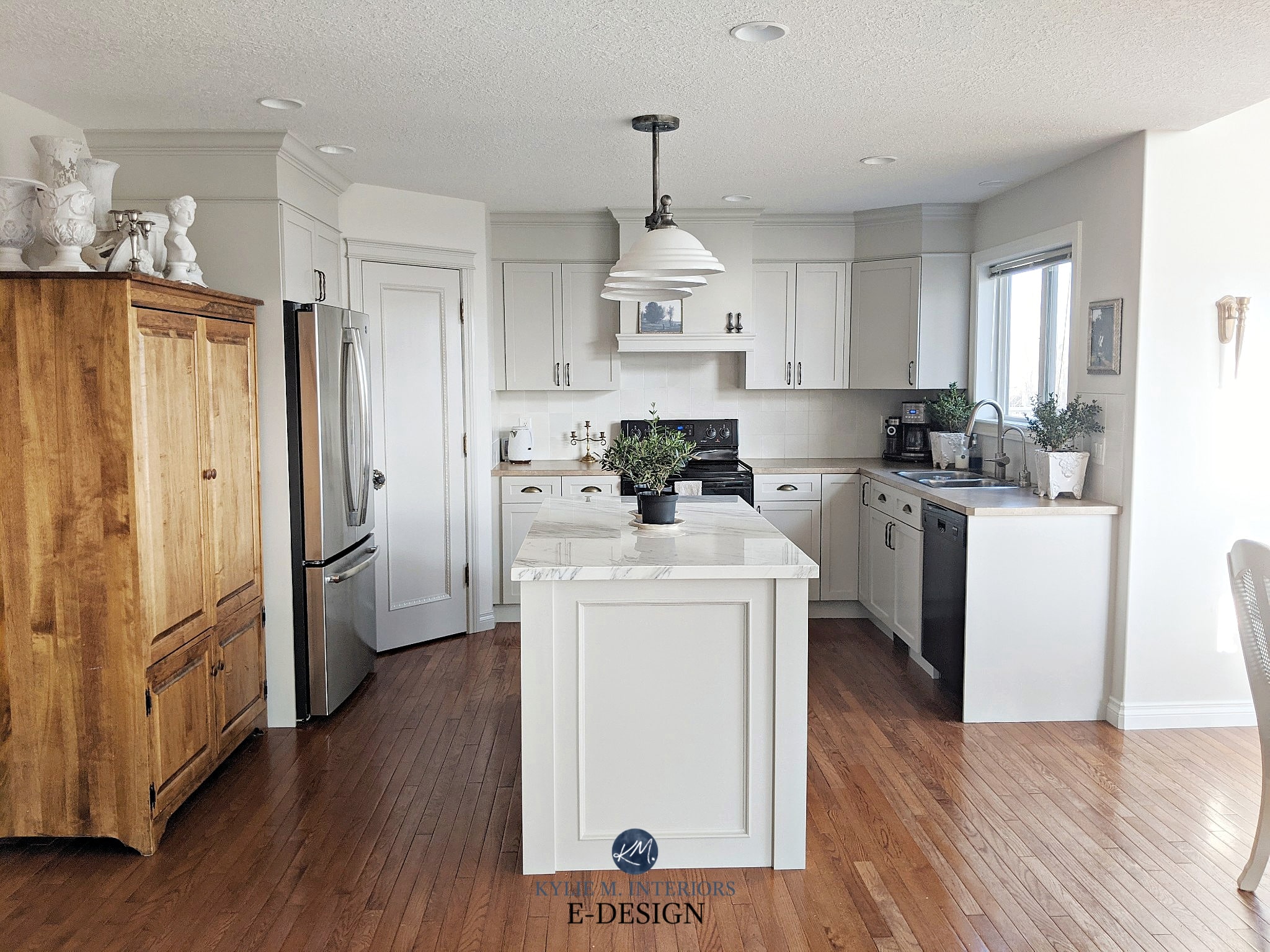 Gray greige painted kitchen maple cabinets. Marble island and beige laminate countertop. Kylie M Interiors Edesign, Benjamin Moore and Sherwin Agreeable Gray, Classic Gray