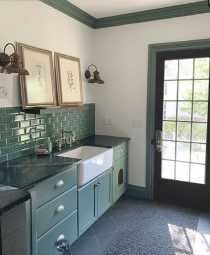 Green painted wood cabinet in laundry and mud room. White Dove walls, slate flooring. Soapstone countertop. Kylie M Interiors Edesign, online paint color blog DIY