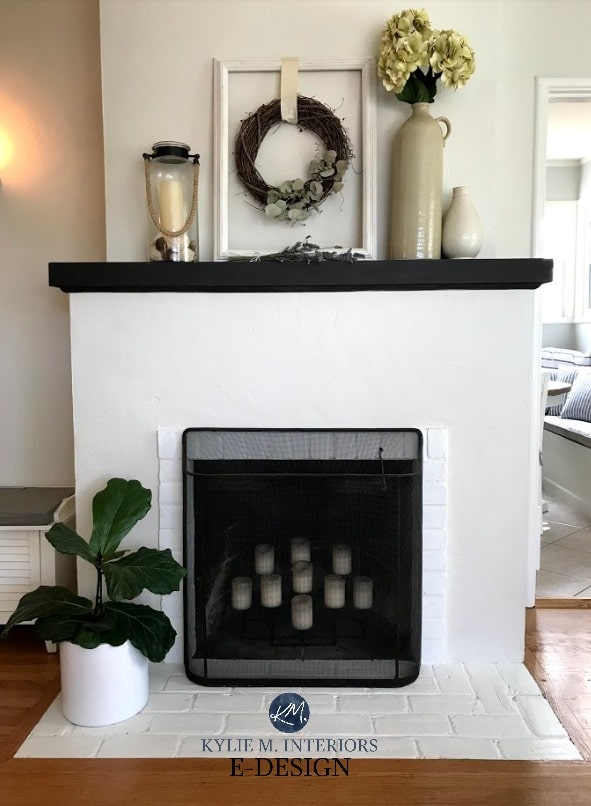 Painted stucco and brick fireplace. Painted Ballet White and White Dove with black mantel and country home decor. Kylie M Interiors Edesign, online paint color advice blog