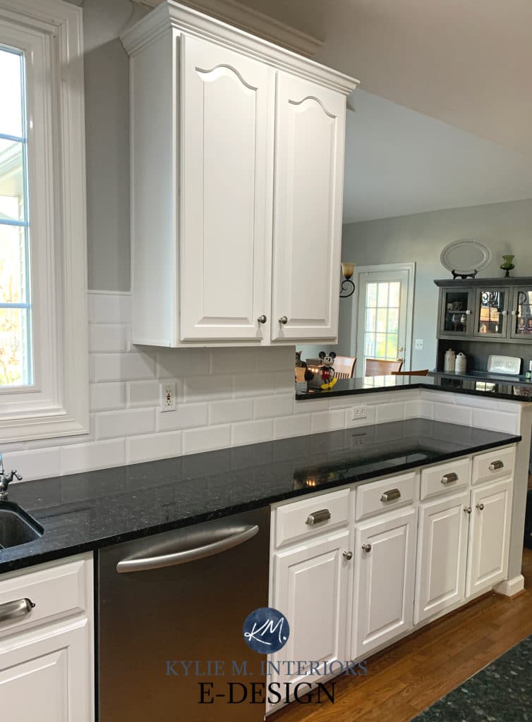 Painted wood maple cabinets. Pure White and Iron Ore, Sherwin Williams Kylie M Interiors online virtual paint color and decorating advice. Black granite countertops