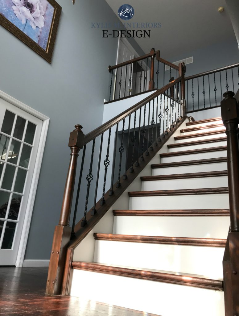 Sherwin Williams Jubilee in 2 storey entryway foyer with dark wood railing and stairs. Best cool blue gray paint colour. Kylie M Interiors edesign