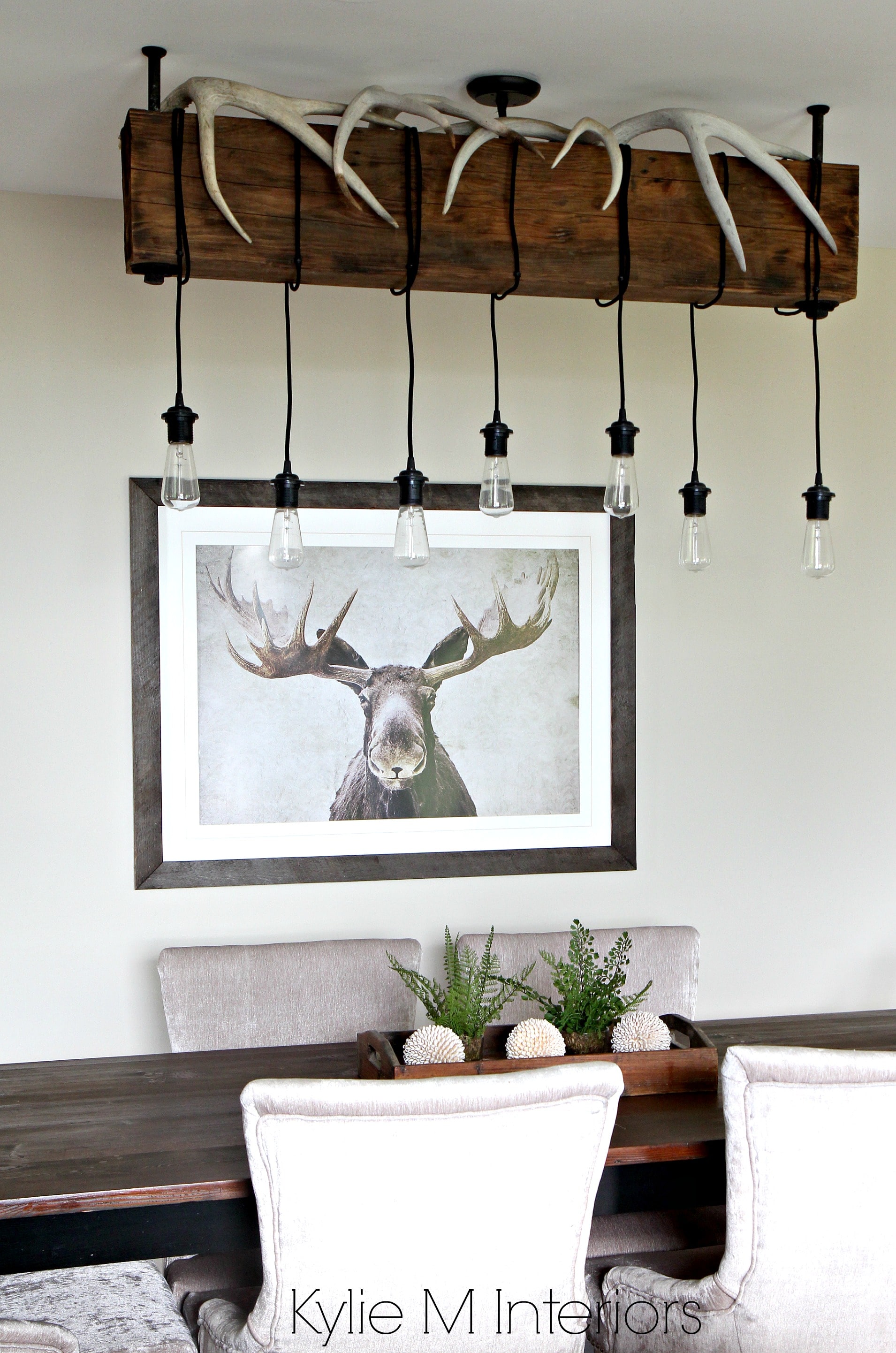 Benjamin Moore Grant Beige, Rustic, hunting decor with industrial chandelier (DIY). Kylie M Interiors DEsign Consultant, E-Design