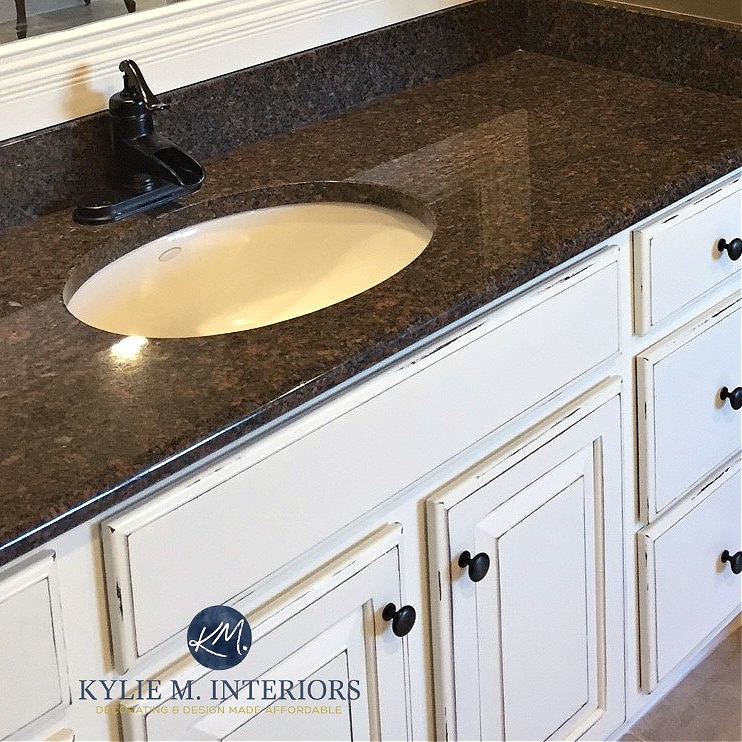 Black granite with taupe pink flecks and cream cabinet. Kylie M Interiors kitchen update modernize ideas and tips