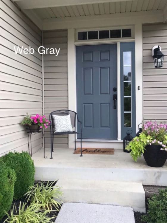 Exterior front door, beige siding, Sherwin Williams Web Gray. Kylie M Interiors Edesign, online consulting, Certapro visualizer
