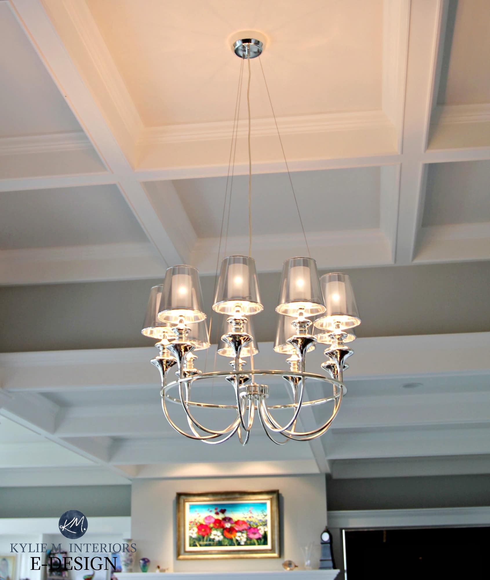 Glam chrome chandelier with coffered ceilings. Kylie M Interior E-design