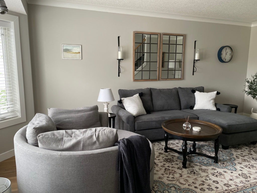 Gray sofa with Benjamin Moore Rodeo, warm grey paint colour like Revere Pewter. Kylie M