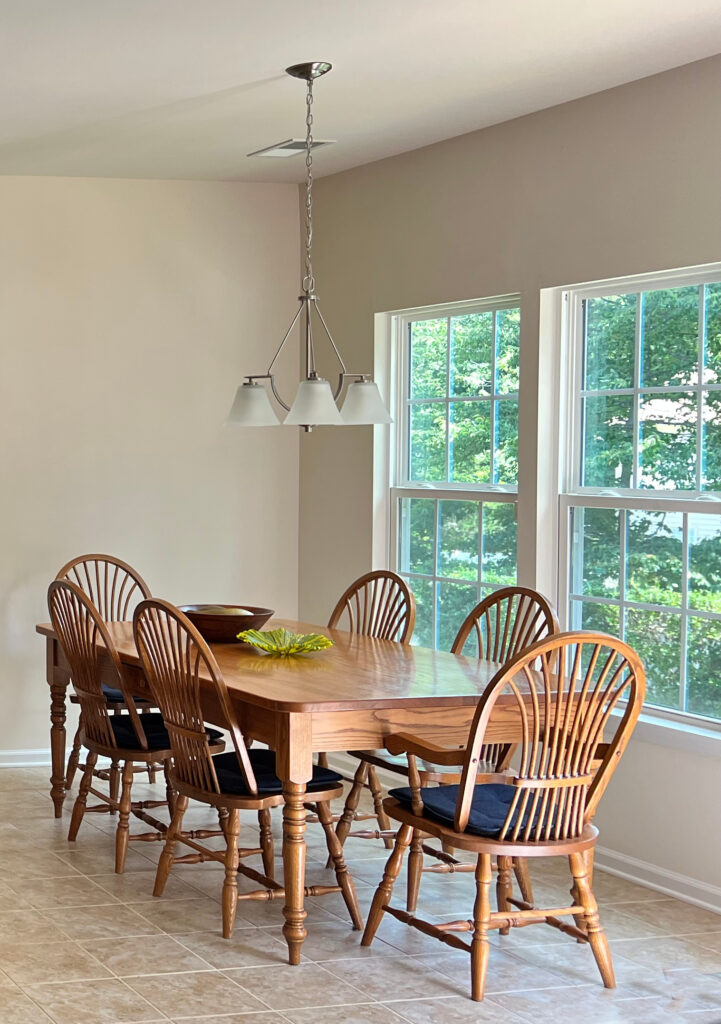 Sherwin Williams best off white beige paint colour, Moderate White, beige tile floor, oak dining room
