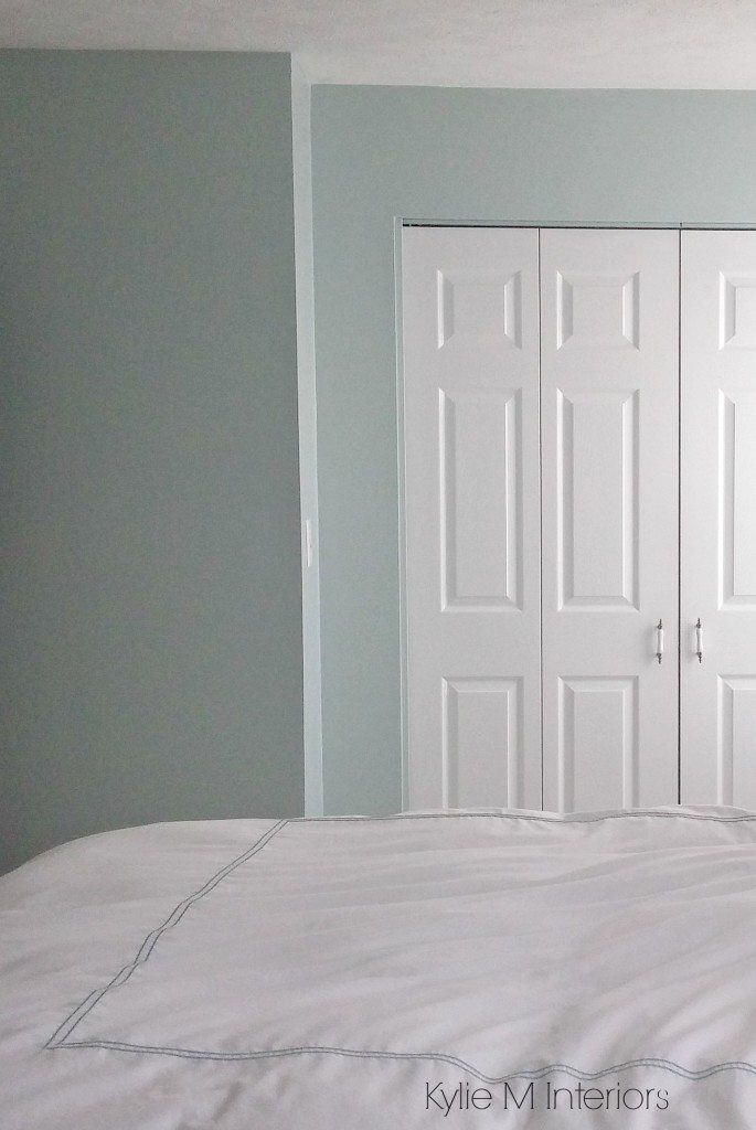 Sherwin Williams Rainwashed is a blue green gray blended paint colours. Shown in bedroom. Color consulting by Kylie M Interiors